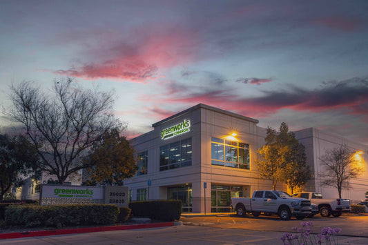 Factory warehouse in California against a setting sun backdrop